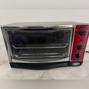 Oster 6295 6-Slice Convection Toaster Oven, Red